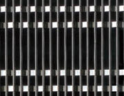 Hard mesh offers parking garage or window trim innovative solution